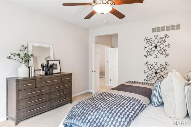 104 Eagle Cove Pl Unit 39B, Saint Charles, MO 63303 - bedroom with light carpet, baseboards, and ceiling fan