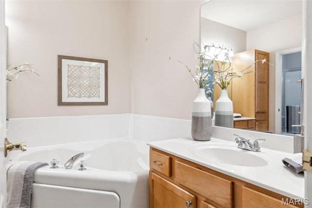 104 Eagle Cove Pl Unit 39B, Saint Charles, MO 63303 - bathroom featuring a garden tub and vanity