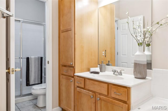 104 Eagle Cove Pl Unit 39B, Saint Charles, MO 63303 - full bathroom featuring a stall shower, toilet, tile patterned floors, and vanity