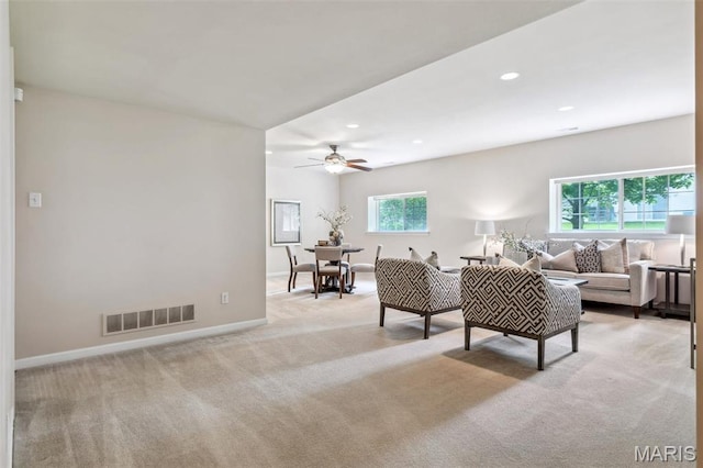 104 Eagle Cove Pl Unit 39B, Saint Charles, MO 63303 - living area featuring light colored carpet, recessed lighting, baseboards, and a ceiling fan