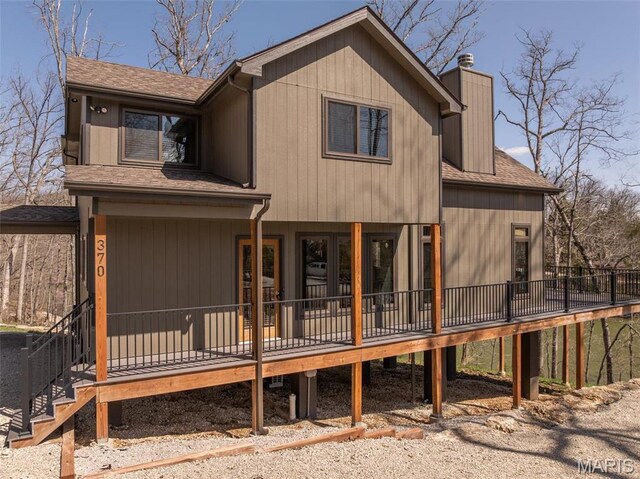 370 Alpine Bend Dr, Wright City, MO 63390 - rear view of property featuring roof with shingles, a chimney, and a deck