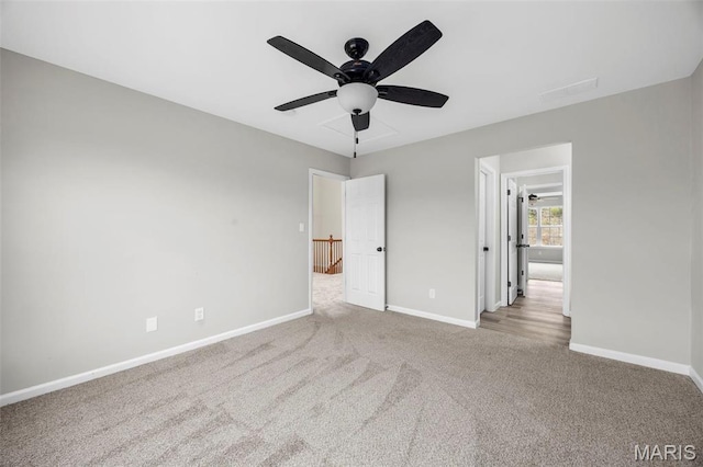 407 Forby Estates Dr, Eureka, MO 63025 - unfurnished bedroom with carpet floors, baseboards, and ceiling fan