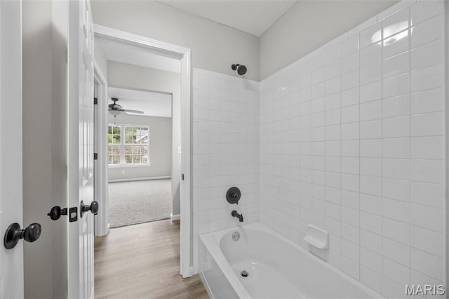 407 Forby Estates Dr, Eureka, MO 63025 - bathroom featuring shower / bathtub combination, a ceiling fan, and wood finished floors