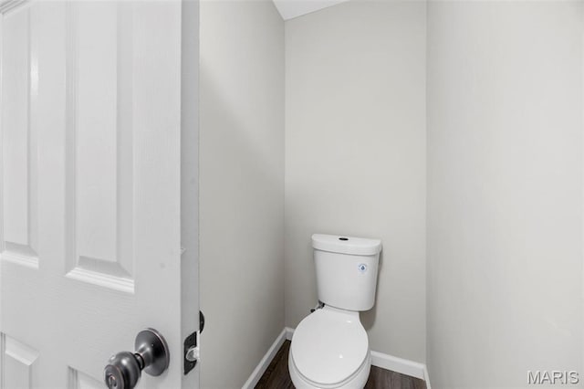407 Forby Estates Dr, Eureka, MO 63025 - bathroom with baseboards, toilet, and wood finished floors