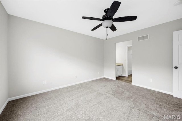 407 Forby Estates Dr, Eureka, MO 63025 - unfurnished bedroom featuring carpet flooring, baseboards, ensuite bath, and a ceiling fan