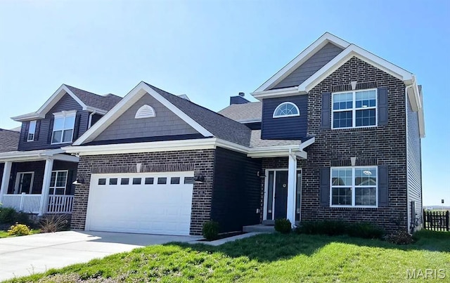 145 Pampano Ln, Saint Charles, MO 63301 - traditional home with brick siding, a garage, a front lawn, and driveway
