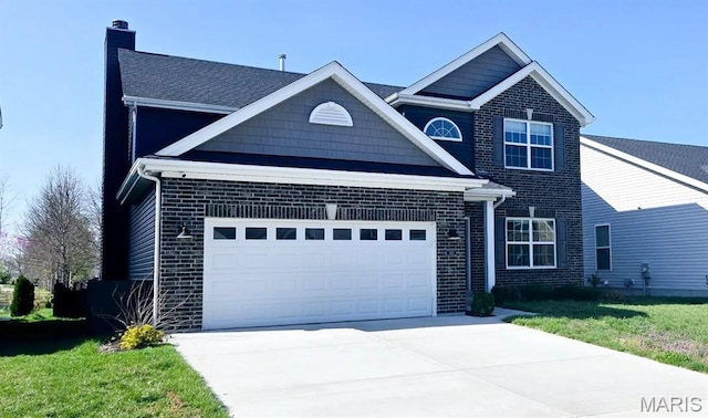 145 Pampano Ln, Saint Charles, MO 63301 - traditional-style house featuring a garage, concrete driveway, brick siding, and a chimney