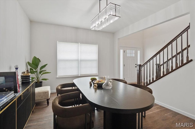 145 Pampano Ln, Saint Charles, MO 63301 - dining space with dark wood-style floors, baseboards, and stairway