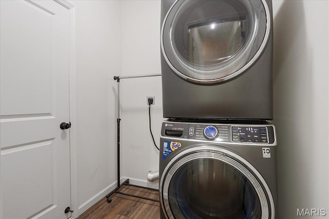 145 Pampano Ln, Saint Charles, MO 63301 - washroom featuring stacked washer / drying machine, wood finished floors, and baseboards