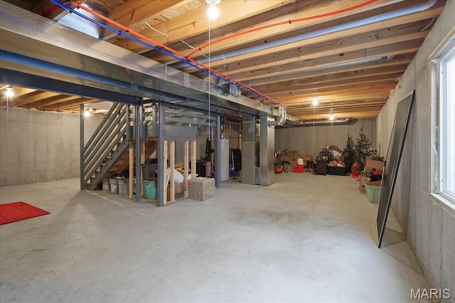 145 Pampano Ln, Saint Charles, MO 63301 - basement featuring heating unit, water heater, and stairs
