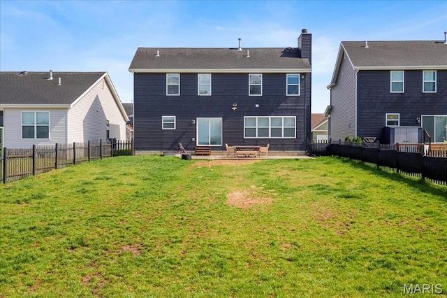 145 Pampano Ln, Saint Charles, MO 63301 - back of property with entry steps, a chimney, and cooling unit