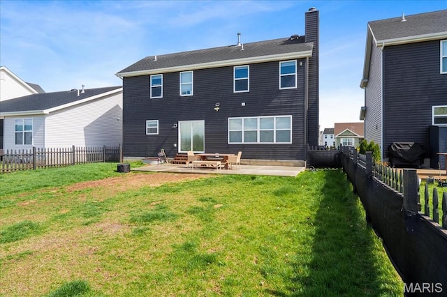 145 Pampano Ln, Saint Charles, MO 63301 - rear view of house with a chimney, a patio, and entry steps