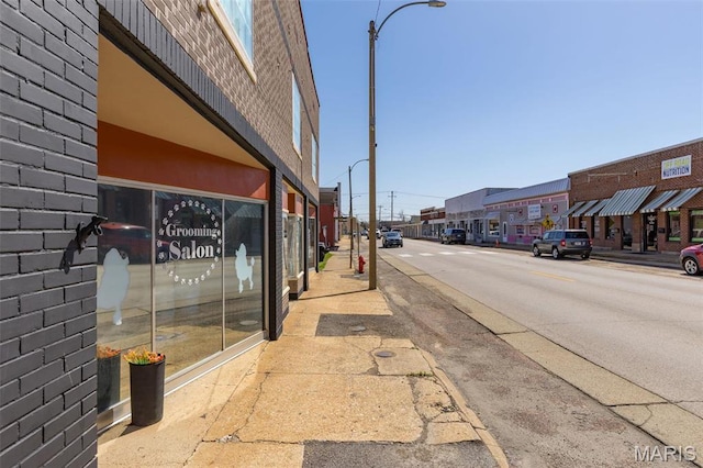 32 W School St, Bonne Terre, MO 63628 - view of asphalt street with sidewalks, street lighting, and curbs