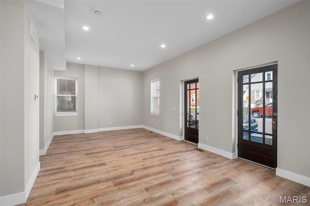 6800 Minnesota Ave, Saint Louis, MO 63111 - foyer featuring healthy amount of natural light, light wood-type flooring, recessed lighting, and baseboards