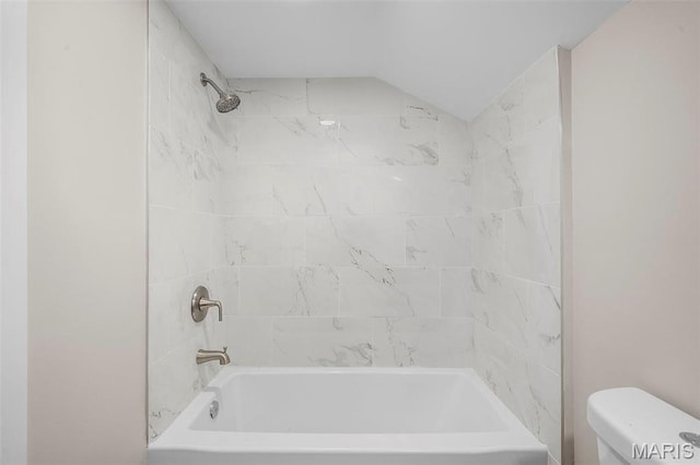 6800 Minnesota Ave, Saint Louis, MO 63111 - bathroom featuring toilet, shower / tub combination, and vaulted ceiling
