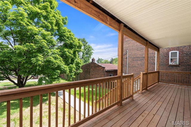 6800 Minnesota Ave, Saint Louis, MO 63111 - wooden deck featuring a lawn