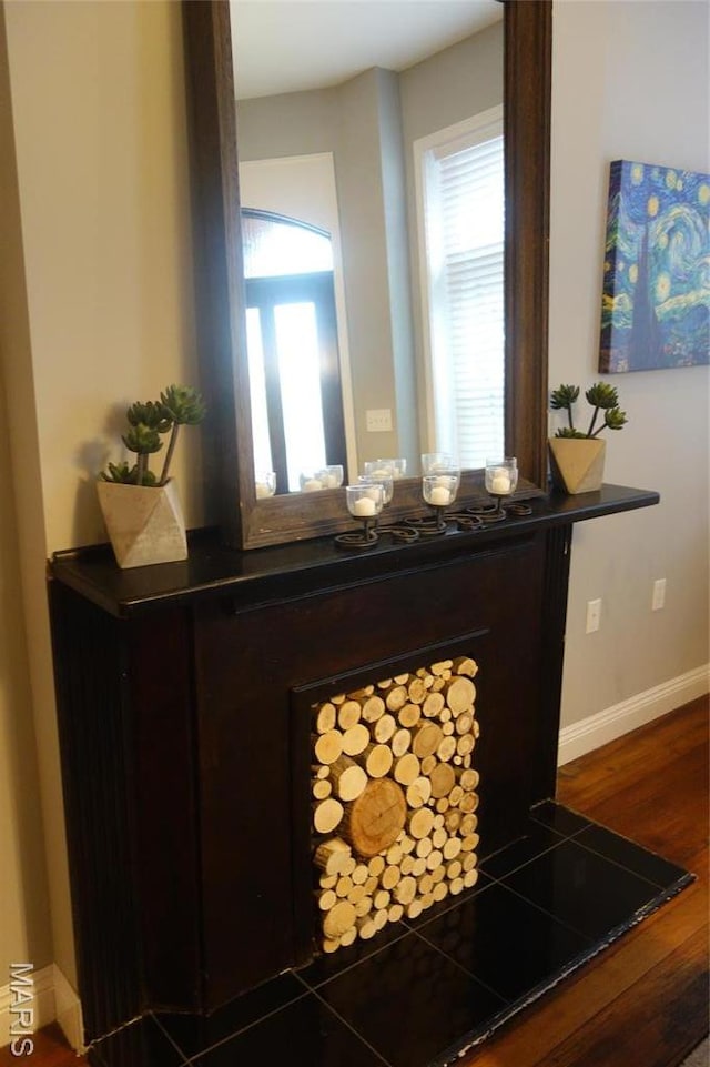 detailed view of wood finished floors and baseboards