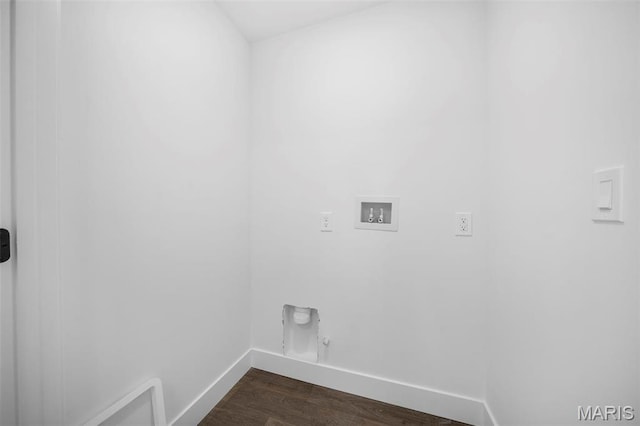 laundry area with baseboards, washer hookup, dark wood finished floors, and gas dryer hookup