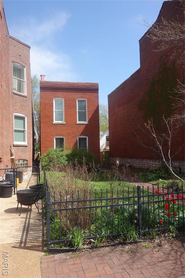 view of patio / terrace featuring fence