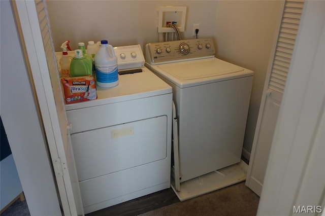 washroom with washer and dryer