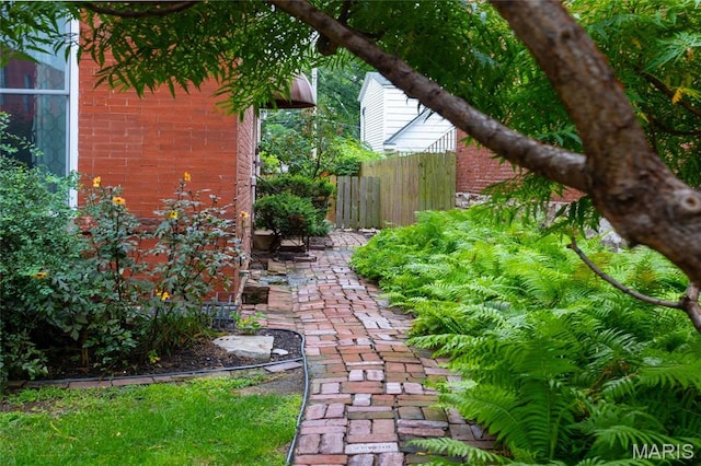 view of yard featuring fence