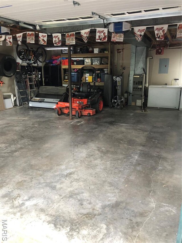 1653 Lakeshore Dr, Cuba, MO 65453 - garage featuring electric panel and a garage door opener