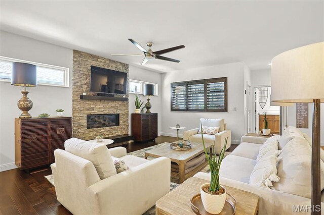 1420 Randle St, Edwardsville, IL 62025 - living area with baseboards, ceiling fan, a fireplace, and dark wood-type flooring