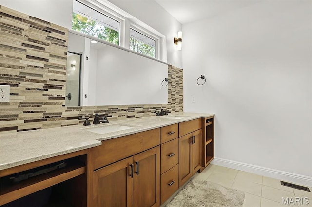 1420 Randle St, Edwardsville, IL 62025 - full bath with tile patterned flooring, tasteful backsplash, double vanity, beverage cooler, and an enclosed shower