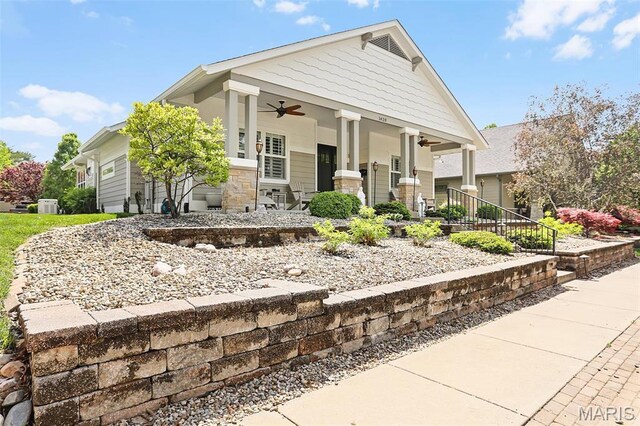 1420 Randle St, Edwardsville, IL 62025 - craftsman-style house with covered porch, ceiling fan, and stone siding
