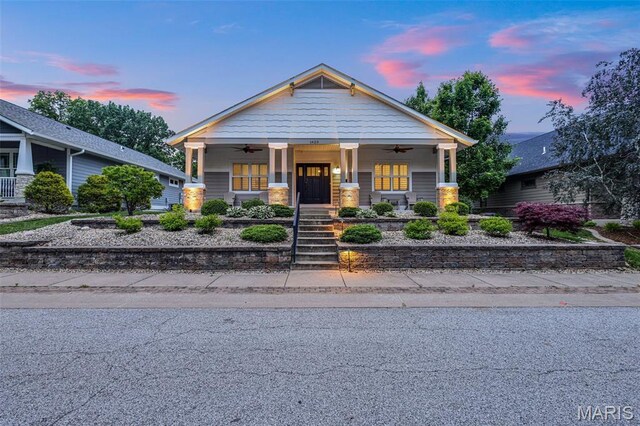 1420 Randle St, Edwardsville, IL 62025 - craftsman house featuring ceiling fan, a porch, and stairs