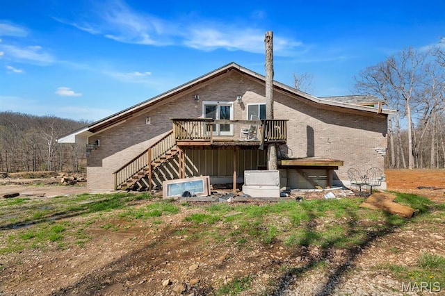 14742 Madison Ln, Wright City, MO 63390 - back of house with brick siding, a deck, and stairway