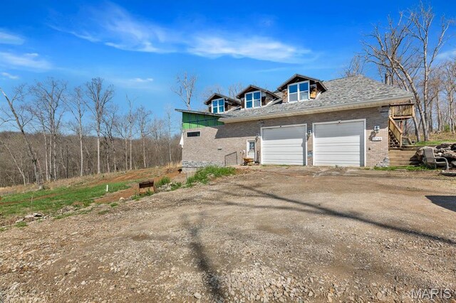 14742 Madison Ln, Wright City, MO 63390 - garage with dirt driveway