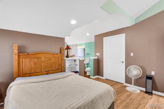 14742 Madison Ln, Wright City, MO 63390 - bedroom with light wood-style flooring, baseboards, recessed lighting, and ensuite bath