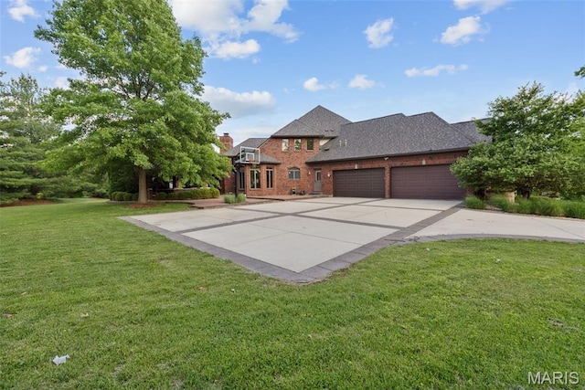 10711 Kennerly Rd, Saint Louis, MO 63128 - view of front facade with a front lawn, brick siding, concrete driveway, an attached garage, and roof with shingles