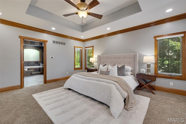 10711 Kennerly Rd, Saint Louis, MO 63128 - carpeted bedroom with a tray ceiling, recessed lighting, ornamental molding, baseboards, and ensuite bathroom