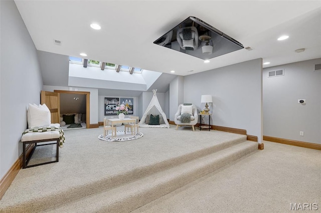 10711 Kennerly Rd, Saint Louis, MO 63128 - living room featuring carpet floors, baseboards, recessed lighting, and a skylight