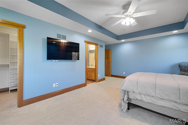 10711 Kennerly Rd, Saint Louis, MO 63128 - carpeted bedroom featuring a walk in closet, baseboards, recessed lighting, a closet, and ceiling fan