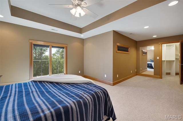 10711 Kennerly Rd, Saint Louis, MO 63128 - bedroom featuring baseboards, recessed lighting, light carpet, a spacious closet, and ceiling fan