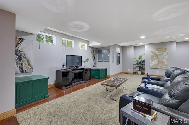 10711 Kennerly Rd, Saint Louis, MO 63128 - living area featuring baseboards, wood finished floors, and recessed lighting