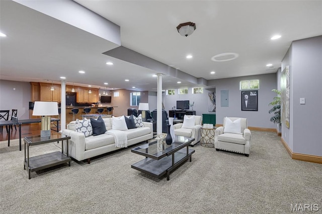 10711 Kennerly Rd, Saint Louis, MO 63128 - carpeted living area featuring recessed lighting, baseboards, and healthy amount of natural light