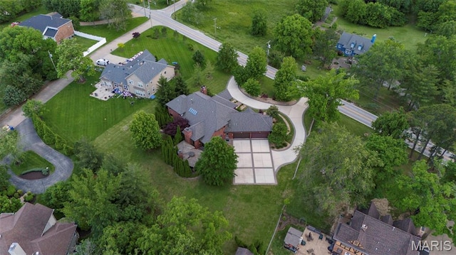 10711 Kennerly Rd, Saint Louis, MO 63128 - aerial overview of property's location with nearby suburban area