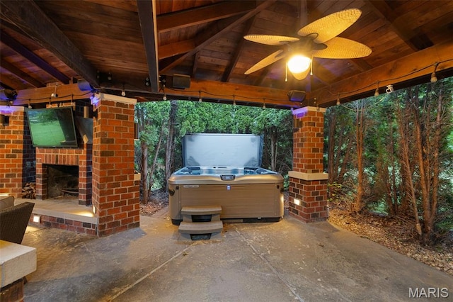 10711 Kennerly Rd, Saint Louis, MO 63128 - view of patio / terrace featuring an outdoor brick fireplace, a gazebo, ceiling fan, and a hot tub