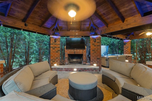 10711 Kennerly Rd, Saint Louis, MO 63128 - view of patio / terrace with a gazebo and an outdoor living space with a fireplace