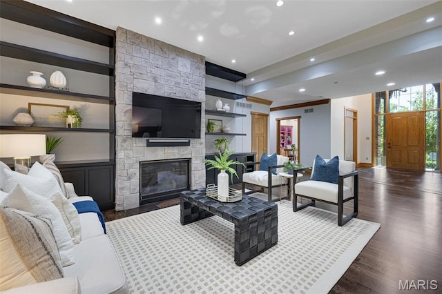 10711 Kennerly Rd, Saint Louis, MO 63128 - living room with recessed lighting, wood finished floors, a fireplace, and baseboards