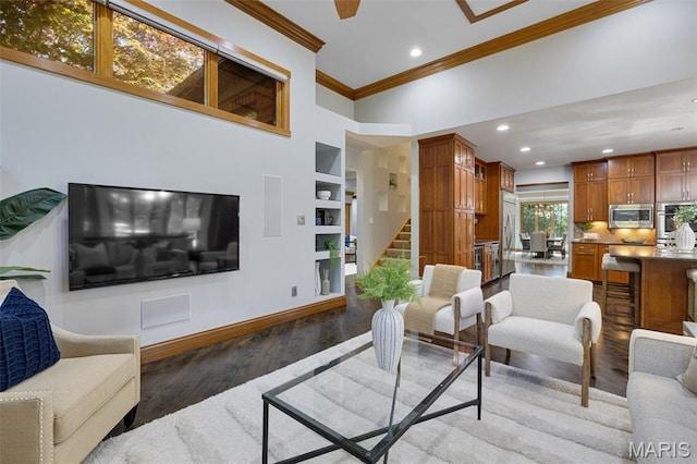 10711 Kennerly Rd, Saint Louis, MO 63128 - living area featuring crown molding, stairs, recessed lighting, light wood-style floors, and baseboards