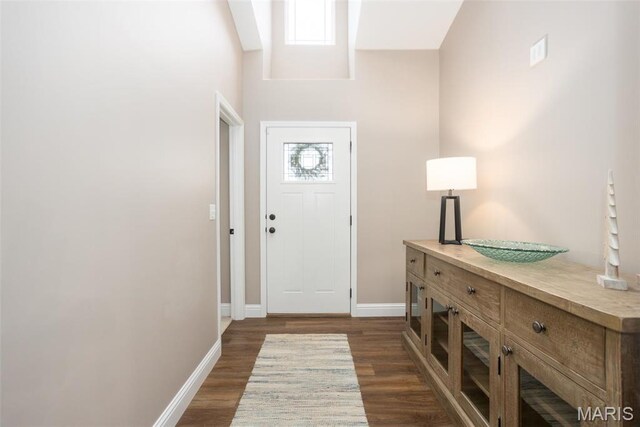 1027 Watering Stone Ct, Pevely, MO 63070 - entrance foyer with dark wood-style flooring and baseboards