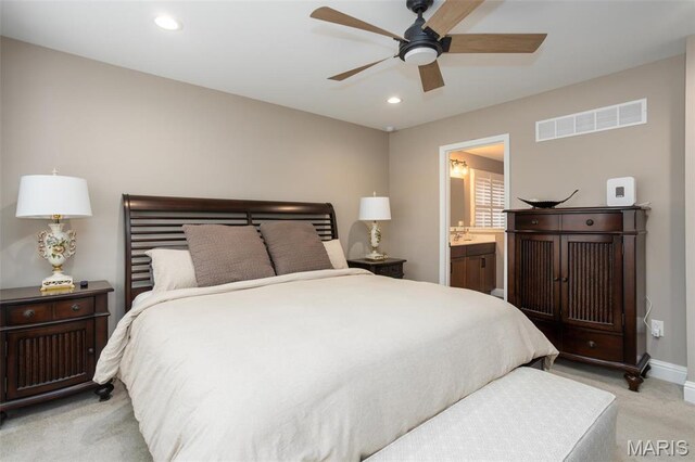 1027 Watering Stone Ct, Pevely, MO 63070 - bedroom featuring light carpet, recessed lighting, ensuite bath, baseboards, and a ceiling fan