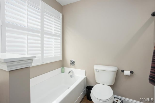1027 Watering Stone Ct, Pevely, MO 63070 - full bath featuring a garden tub, toilet, and baseboards