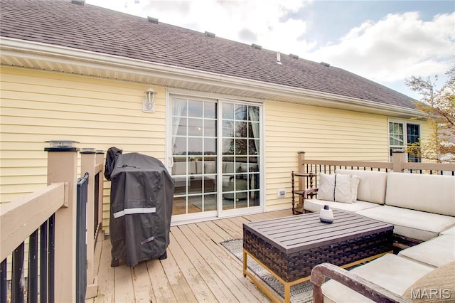 deck featuring outdoor lounge area and area for grilling