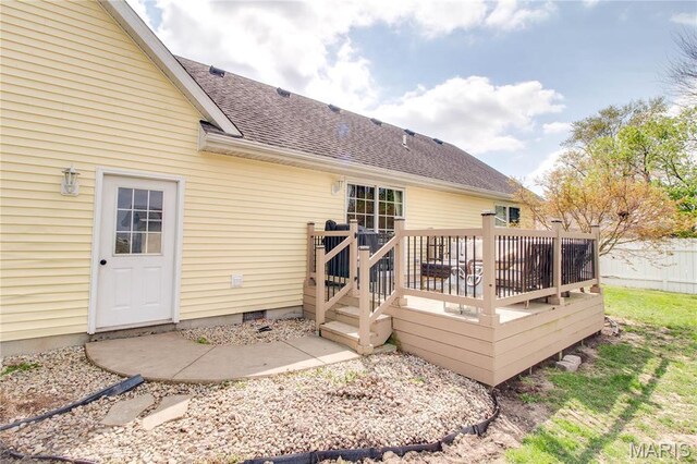 back of property featuring a deck, a shingled roof, crawl space, and fence